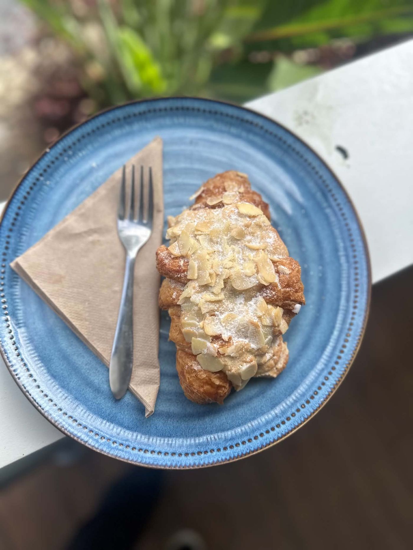 Almond croissant on a plate